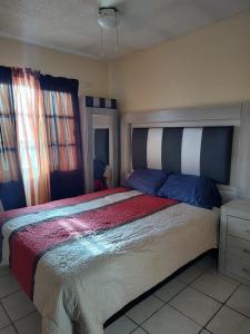 Postel nebo postele na pokoji v ubytování Casa 2121