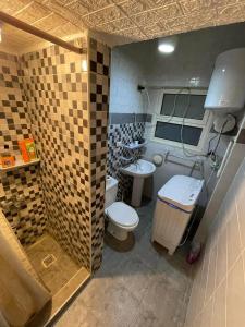 Koupelna v ubytování Single Room in Downtown