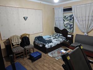 Postel nebo postele na pokoji v ubytování Single Room in Downtown