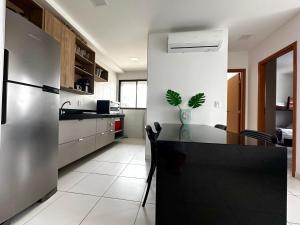 Kuchyň nebo kuchyňský kout v ubytování Mana Beach Muro Alto - 2 quartos e Varanda frente piscina