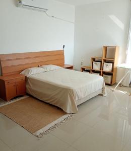 Ένα ή περισσότερα κρεβάτια σε δωμάτιο στο CASA VIP beach and business