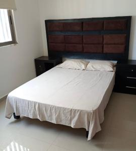 Ένα ή περισσότερα κρεβάτια σε δωμάτιο στο CASA VIP beach and business