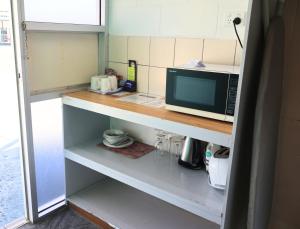 Kuchyň nebo kuchyňský kout v ubytování The Park Motel