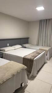 Ένα ή περισσότερα κρεβάτια σε δωμάτιο στο Portobello Park Hotel