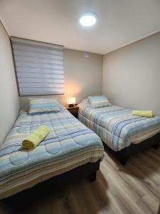 Postel nebo postele na pokoji v ubytování Dpto full equipado,dormitorio en suite en Valdivia