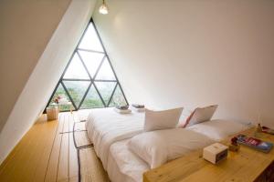 Postel nebo postele na pokoji v ubytování Morning Cloud - Chiang Mai