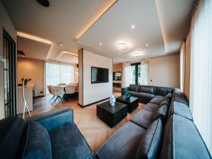 Posezení v ubytování Beautiful holiday home in Waarland