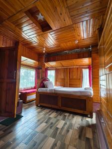 Postel nebo postele na pokoji v ubytování Ribsweet Treetops Bed and Breakfast