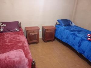 Postel nebo postele na pokoji v ubytování Ely Departamento Jujuy + 1 fotografie