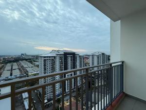 a balcony with a view of a city at MountAustin Projector 3BR 8pax NEW in Johor Bahru