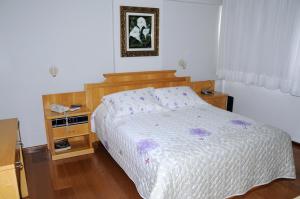 Postel nebo postele na pokoji v ubytování Hotel Elite