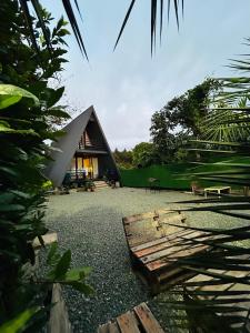 a house that is sitting on a gravel yard at Rakushki's house 2 in K'obulet'i