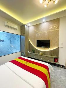 Postel nebo postele na pokoji v ubytování GRAD Queen Urban Mo Lao + 4 fotografie