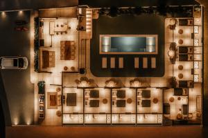 a model of a floor plan of a building at Kavo Maison Surf & Yoga Camp in Munggu