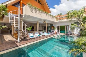 an image of a villa with a swimming pool at Villa Josefine, 5 Bedroom pool, rooftop, pool table in Seminyak