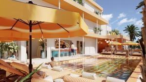 an image of a hotel swimming pool with umbrellas at Riviera Hotel Menorca in Ciutadella