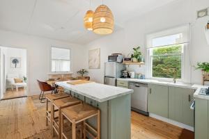 a kitchen with a large island with a counter top at Willow McLaren Vale in McLaren Vale