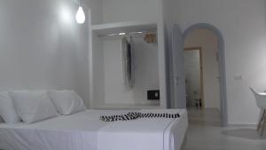 Letto o letti in una camera di Daylight Hotel