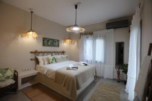 Postel nebo postele na pokoji v ubytování Villa Bamboo