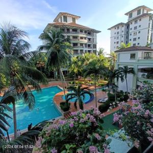 a view of the pool from the balcony of a resort at One Bedroom NO Heater ,Mahkota Hospital , Parade , Pahlawan in Melaka