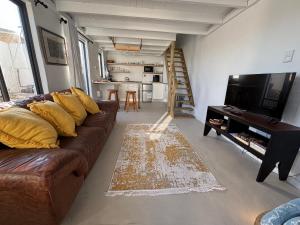 Μια τηλεόραση ή/και κέντρο ψυχαγωγίας στο Blue Fish Cottage