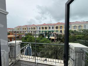 a view of a building from a balcony at Three women in Phu Quoc
