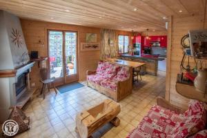 Kuchyň nebo kuchyňský kout v ubytování Aubier Confort Spa Chalet Domaine du Fraizier