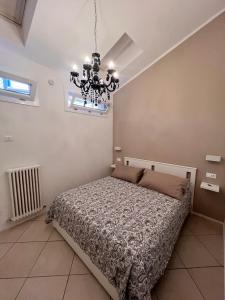 Ένα ή περισσότερα κρεβάτια σε δωμάτιο στο Saragozza 223 Deluxe Apartment +12 φωτογραφίες