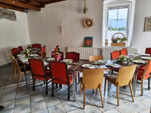 a dining room with a table and chairs at Locanda EL TORO in Arnoldstein