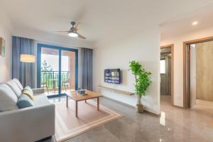 TV a/nebo společenská místnost v ubytování Hexu Yanju Hotel