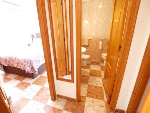 a bathroom with a toilet and a sink at Enjoy a stylish experience at this centrally-located place ! in Dublin