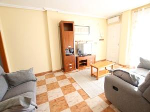 a living room with a couch and a table at Enjoy a stylish experience at this centrally-located place ! in Dublin
