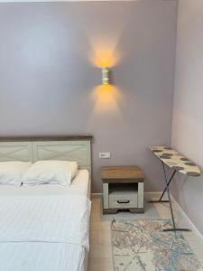 Ένα ή περισσότερα κρεβάτια σε δωμάτιο στο Комфортная 2 комнатная квартира