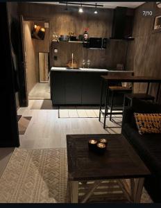 a living room with a couch and a table at Lillahuset in Sundsvall