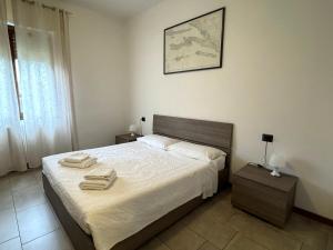 Postel nebo postele na pokoji v ubytování Il Ricordo - Appartamento con Giardino
