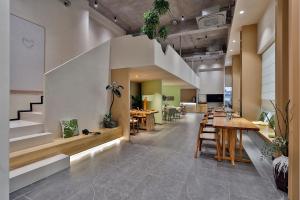 Kuchyň nebo kuchyňský kout v ubytování 遇萌悦漫居酒店绍兴鲁迅故里景区仓桥直街店