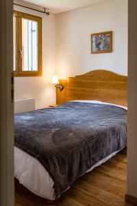 Postel nebo postele na pokoji v ubytování Apartment for 4 to 6 people in Albiez