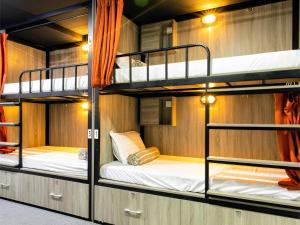 Ένα ή περισσότερα κρεβάτια σε δωμάτιο στο Base Backpackers +39 φωτογραφίες