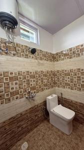 Koupelna v ubytování Datta's Heritage