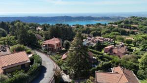 arial view of a residential neighborhood with a lake at Alloggio Panorama in Rocca di Papa