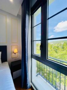 Postel nebo postele na pokoji v ubytování Oceanis Hotel + 88 fotografií