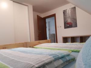 Postel nebo postele na pokoji v ubytování Monteurwohnung mit 3 Schlafzimmer Haus 9