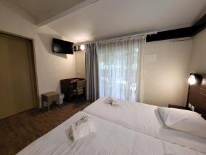 Postel nebo postele na pokoji v ubytování VVF Golfe de Saint-Tropez + 18 fotografií