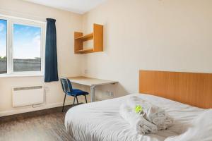 En eller flere senge i et værelse på Affordable Ensuite Rooms Near Central Nottingham
