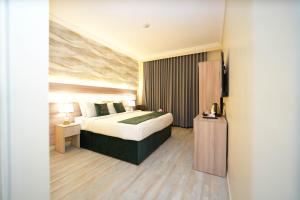 Gambar di galeri bagi روز هوليداي اي3 Rose Holiday i3 di Madinah