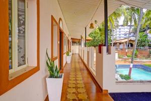 Swimmingpoolen hos eller tæt på FabHotel Baga Village Home- Nr Baga Beach