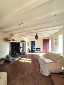 a large living room with a bed and a fireplace at Escape to your dream Samui beach Villa ! in Ban Na We