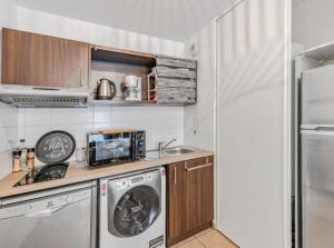 Η κουζίνα ή μικρή κουζίνα στο Apt Disneyland 2 chambres, parking, bus sur place