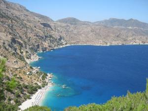 a view of a beach on the side of a mountain at Amaryllis Hotel in Karpathos