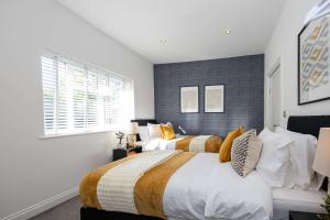 Ένα ή περισσότερα κρεβάτια σε δωμάτιο στο Cosy apartment in the heart of Sale